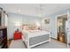 Comfortable bedroom with a decorative bed frame, ceiling fan, and light blue walls for a cozy atmosphere at 62 Gadsden St # A, Charleston, SC 29401