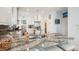 Contemporary kitchen featuring a large island, granite countertops, stainless appliances, and bar seating at 62 Gadsden St # A, Charleston, SC 29401