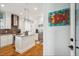Bright, modern kitchen featuring granite countertops, stainless steel appliances, and a functional island at 62 Gadsden St # A, Charleston, SC 29401