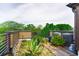 Well-maintained rooftop patio featuring desert plants, stones, and a partial view of the surrounding landscape at 62 Gadsden St # A, Charleston, SC 29401