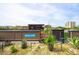 Rooftop patio with pebble flooring, lush plants, and a 'Happy Place' sign at 62 Gadsden St # A, Charleston, SC 29401