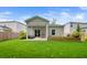 Spacious backyard and lush greenery, perfect for outdoor activities and relaxation at 655 Jancus St, Charleston, SC 29414