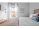 Bright bedroom featuring modern beach decor, and lots of natural light at 655 Jancus St, Charleston, SC 29414