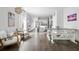 Open living space with a kitchen, dining area, and living room, creating a seamless flow and inviting atmosphere at 655 Jancus St, Charleston, SC 29414