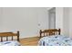 bedroom with hardwood floors and twin beds featuring a pirate-themed bedspread at 679 Edmonds Dr, Charleston, SC 29412