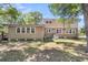 View of the back of the house showing the brick and siding exterior at 679 Edmonds Dr, Charleston, SC 29412