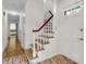 Welcoming home foyer featuring a brick floor and staircase at 679 Edmonds Dr, Charleston, SC 29412