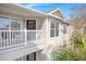 Exterior view of the balcony with white railings and a tropical view at 700 Daniel Ellis Drive # 5303, James Island, SC 29412