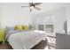 Sun-filled bedroom featuring a ceiling fan and cheery painted dressers at 700 Daniel Ellis Drive # 5303, James Island, SC 29412