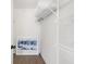 Open closet with wire shelving, wood floor, and an abstract piece of art at 700 Daniel Ellis Drive # 5303, James Island, SC 29412