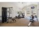 Bright gym with cardio equipment, weight machines, free weights, and ceiling fans at 700 Daniel Ellis Drive # 5303, James Island, SC 29412