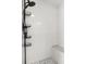 Bright shower with subway tile, a built-in bench, and a black showerhead fixture at 700 Daniel Ellis Drive # 5303, James Island, SC 29412