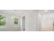 Bright dining room with windows, chair rail detail, crown molding and chandelier at 752 Minton Rd, Charleston, SC 29412