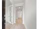 Bright hallway features hardwood floors, crown molding, and access to various rooms in the home at 752 Minton Rd, Charleston, SC 29412