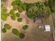 Aerial view of property featuring home, shop, pool, and large yard enclosed by white fencing at 7875 Berry Manor Ln, Edisto Island, SC 29438