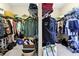 Walk-in closet with organized storage solutions for clothing and personal items at 7875 Berry Manor Ln, Edisto Island, SC 29438