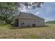 Home exterior with siding, air conditioning units, satellite and an expansive yard at 7875 Berry Manor Ln, Edisto Island, SC 29438