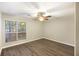 Bright bedroom with large window and durable flooring at 7935 Edgebrook Cir # 2202, North Charleston, SC 29418