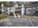 Inviting townhome with covered entrance, chimney, and dedicated parking at 7935 Edgebrook Cir # 2202, North Charleston, SC 29418