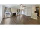 Cozy living room features a fireplace, ceiling fan, neutral paint, and durable flooring at 7935 Edgebrook Cir # 2202, North Charleston, SC 29418