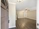Spacious living area with wood floors, ceiling fan, and built-in shelves at 7935 Edgebrook Cir # 2202, North Charleston, SC 29418