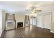 Welcoming living room with fireplace, wood floors and natural light at 7935 Edgebrook Cir # 2202, North Charleston, SC 29418