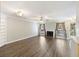 Bright living room featuring wood floors, fireplace, and ample natural light at 7935 Edgebrook Cir # 2202, North Charleston, SC 29418