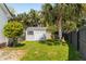 A beautiful backyard with a storage shed and mature palm trees at 930 Richter Way, Mount Pleasant, SC 29464