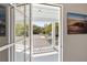 Picturesque view from the balcony, showcasing lush greenery and a charming neighborhood street at 930 Richter Way, Mount Pleasant, SC 29464
