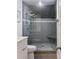 Contemporary bathroom featuring a fully tiled shower with a built-in seat at 930 Richter Way, Mount Pleasant, SC 29464