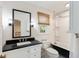 Bathroom features a black and white tile floor, a claw foot tub, and white vanity at 930 Richter Way, Mount Pleasant, SC 29464