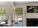 View of the deck from the living room featuring an outdoor seating area and fireplace at 930 Richter Way, Mount Pleasant, SC 29464