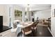 Charming dining area with natural light, built-in bench and views to the deck and living room at 930 Richter Way, Mount Pleasant, SC 29464