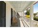 Shaded porch features bench seating offering a relaxing outdoor retreat at 930 Richter Way, Mount Pleasant, SC 29464