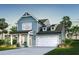 Charming new construction with a covered porch, garage, and landscaped yard at 1034 Marsh Harrier Dr # Cc3-4-3, Ravenel, SC 29470