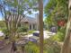 Charming backyard patio featuring tasteful decor and a well-manicured garden, creating an inviting outdoor space at 1061 Reverend Joseph Heyward Rd, Charleston, SC 29414
