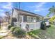 The backyard features a nice deck with a white railing, providing an ideal space for outdoor relaxation and entertaining at 112 Riviera Dr, Summerville, SC 29483