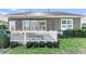 The backyard features a deck and ample yard space, perfect for outdoor living at 112 Riviera Dr, Summerville, SC 29483