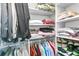 Organized closet with hanging rods, shelves, clothing, shoes, and accessories at 112 Riviera Dr, Summerville, SC 29483