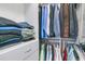 Closet with shelves, drawers, and rods for hanging clothing at 112 Riviera Dr, Summerville, SC 29483