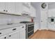 Kitchen featuring a stainless steel oven, white subway tile, countertops, and white cabinets at 112 Riviera Dr, Summerville, SC 29483
