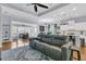 Open-concept living space features hardwood floors, comfortable seating, and ample natural light throughout at 112 Riviera Dr, Summerville, SC 29483