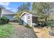 Backyard storage shed provides additional space for storing gardening equipment and tools at 112 Riviera Dr, Summerville, SC 29483