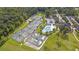 Aerial view of community tennis courts next to a full-size pool with lounge seating at 112 Riviera Dr, Summerville, SC 29483