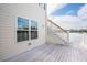 Back deck and staircase with lake view, perfect for enjoying outdoor relaxation at 1144 Clearspring Dr, Charleston, SC 29412