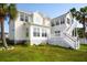 Exterior of the home showing the backyard, deck, and staircase, offering a great outdoor space at 1144 Clearspring Dr, Charleston, SC 29412