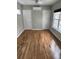 Well-lit bedroom with beautiful wood floors, two closets, and a large window for natural light at 1144 Clearspring Dr, Charleston, SC 29412
