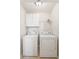 Functional laundry room features a washer, dryer, storage cabinets and wire shelving at 1144 Clearspring Dr, Charleston, SC 29412