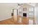 Spacious living room featuring hardwood floors, fireplace, and built-in shelving for ample storage and decor at 1144 Clearspring Dr, Charleston, SC 29412