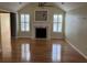 Inviting living room featuring a fireplace, hardwood floors, and lots of natural light at 1144 Clearspring Dr, Charleston, SC 29412